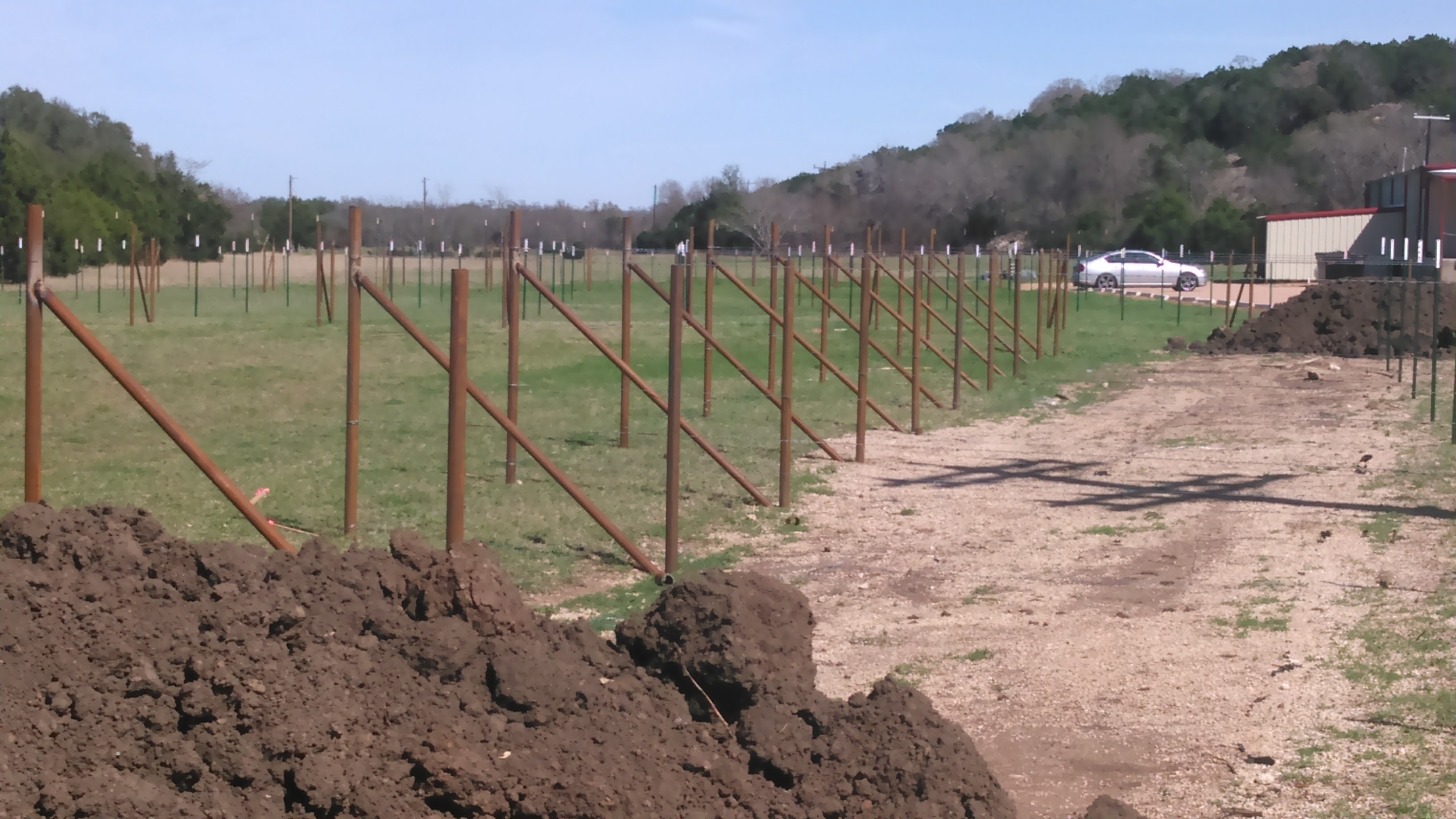Vineyard fencing installation